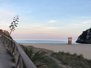 On the beach, sun-loungers, beach towels