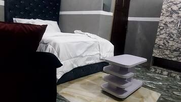 1 chambre, fer et planche Ă  repasser, Wi-Fi, draps fournis