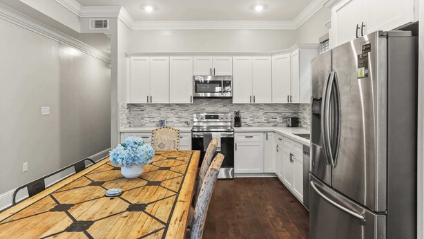 Coffee/tea maker, fridge, microwave, oven