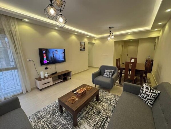 Living area - 803 . Spacious 3BR Apt., 2 Baths, Gated Community (Al Sheikh Zayed)