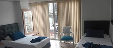 Quarto quádruplo família | Wi-Fi de cortesia, roupa de cama