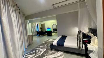 Junior Suite, Balcony, City View | In-room safe, iron/ironing board, free WiFi