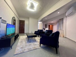 Junior Suite, Balcony, City View | Living area | 40-inch LCD TV with satellite channels, foosball