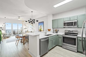 Fridge, microwave, oven, stovetop - Salt and Shore Escape | Beachfront, Pool | Daily Activity Deals (Panama City Beach)