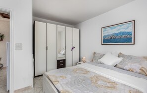 2 habitaciones, cuna de viaje, wifi gratis y ropa de cama
