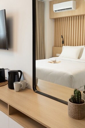 Svit Comfort - utsikt mot staden | Sängtillbehör av högsta kvalitet, duntäcken, bäddmadrasser och minibar
