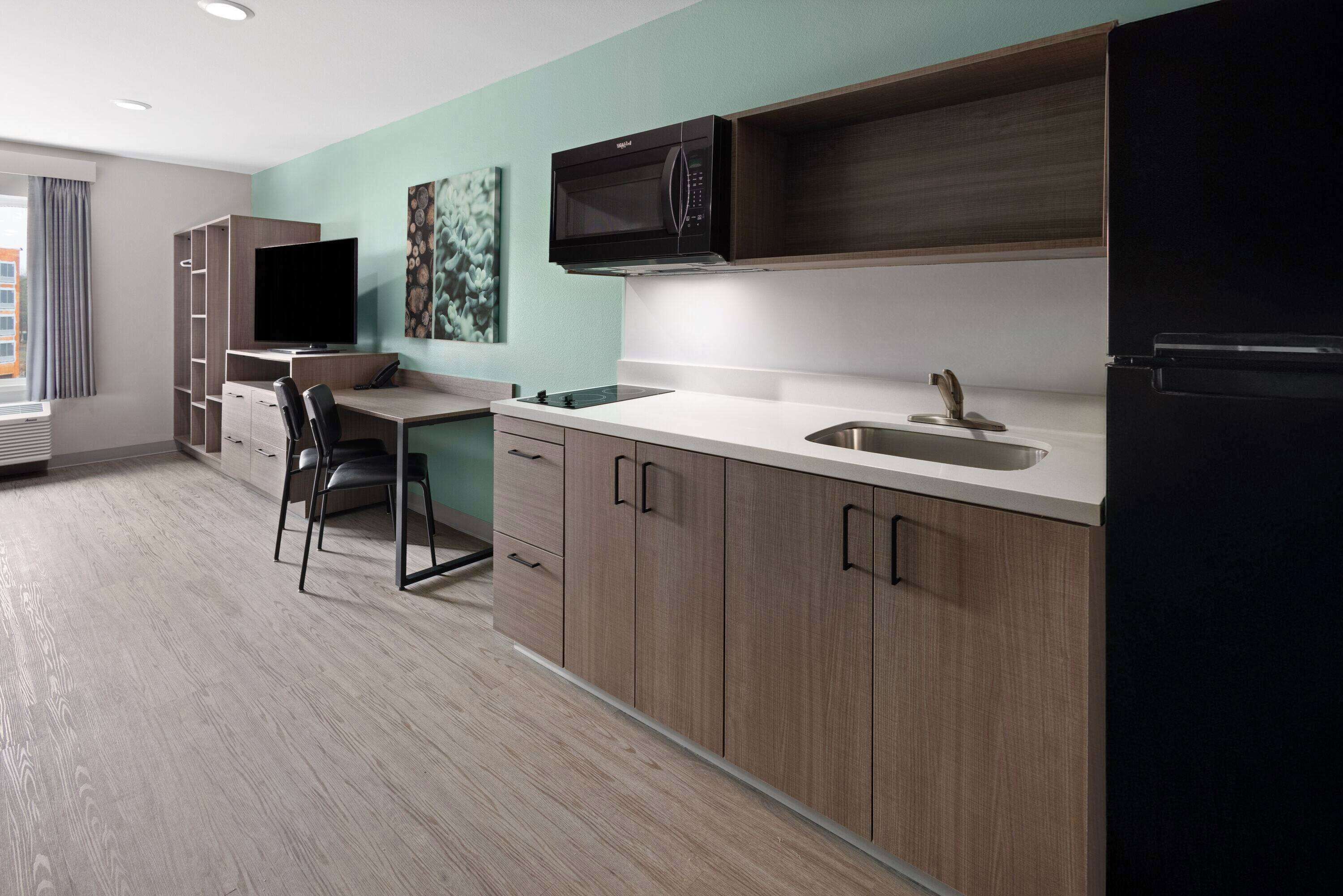 Suite, 2 Queen Beds, Non Smoking | Desk, laptop workspace, free WiFi, bed sheets