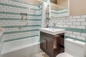 Hair dryer, towels, soap, shampoo