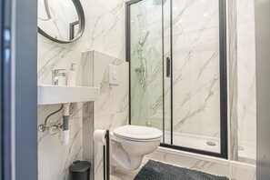 Shower, hair dryer, shampoo