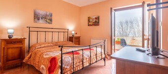 Bed and Breakfast 'Camera Matrimoniale Superior' with Mountain View, Garden and Air Conditioning