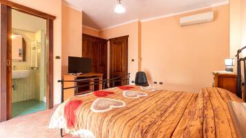 5 slaapkamers, een strijkplank/strijkijzer, beddengoed