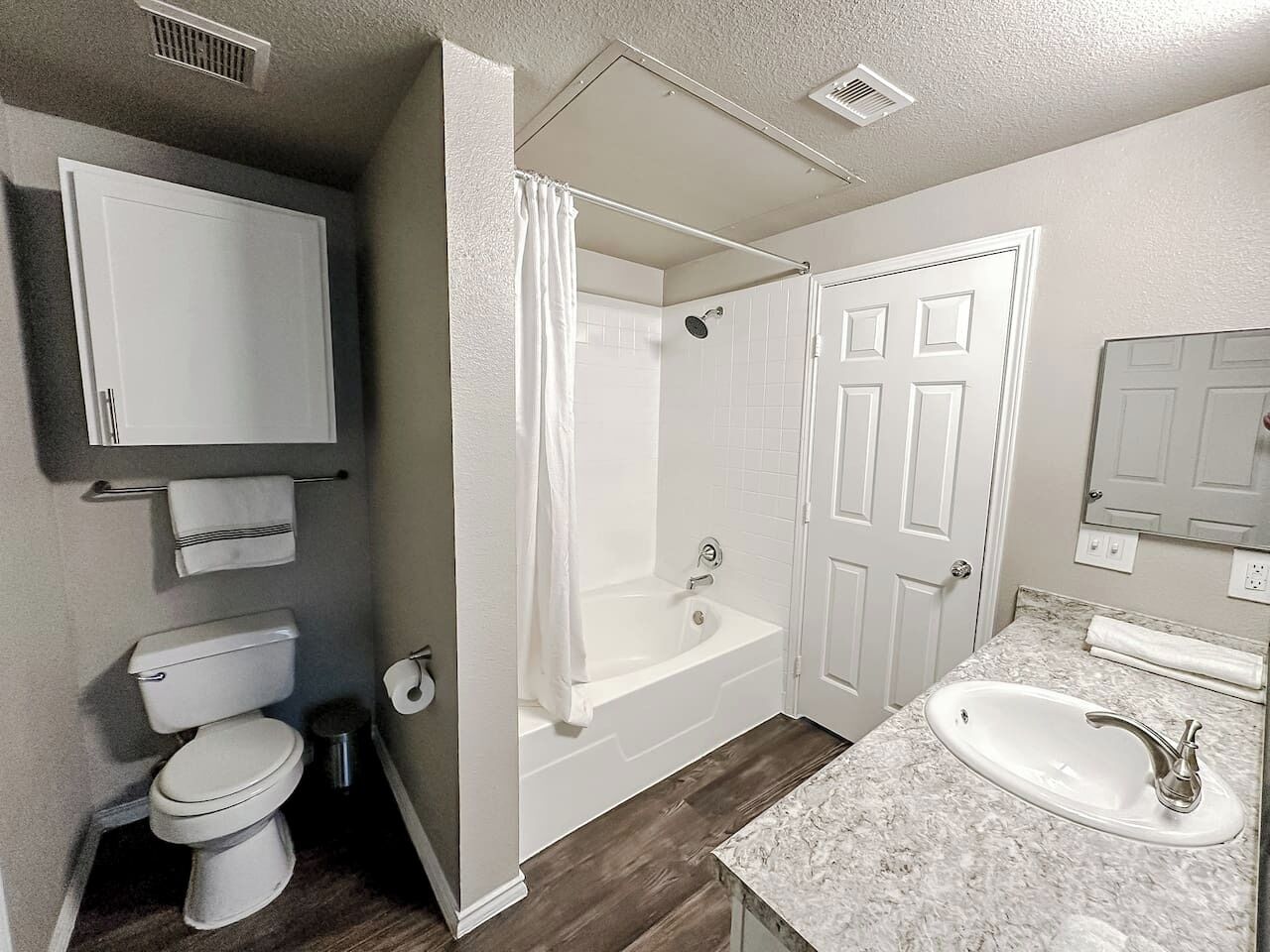 Hair dryer, towels, soap, toilet paper