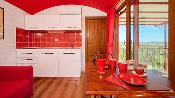 Fridge, stovetop, coffee/tea maker, cookware/dishes/utensils