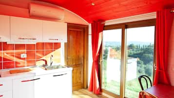 Fridge, stovetop, coffee/tea maker, cookware/dishes/utensils