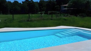 A rectangular swimming pool with clear blue water, surrounded by a white deck. - Rural House 'Chan Da Ra' with Mountain Views, Private Pool and Private Terrace (A Lama)