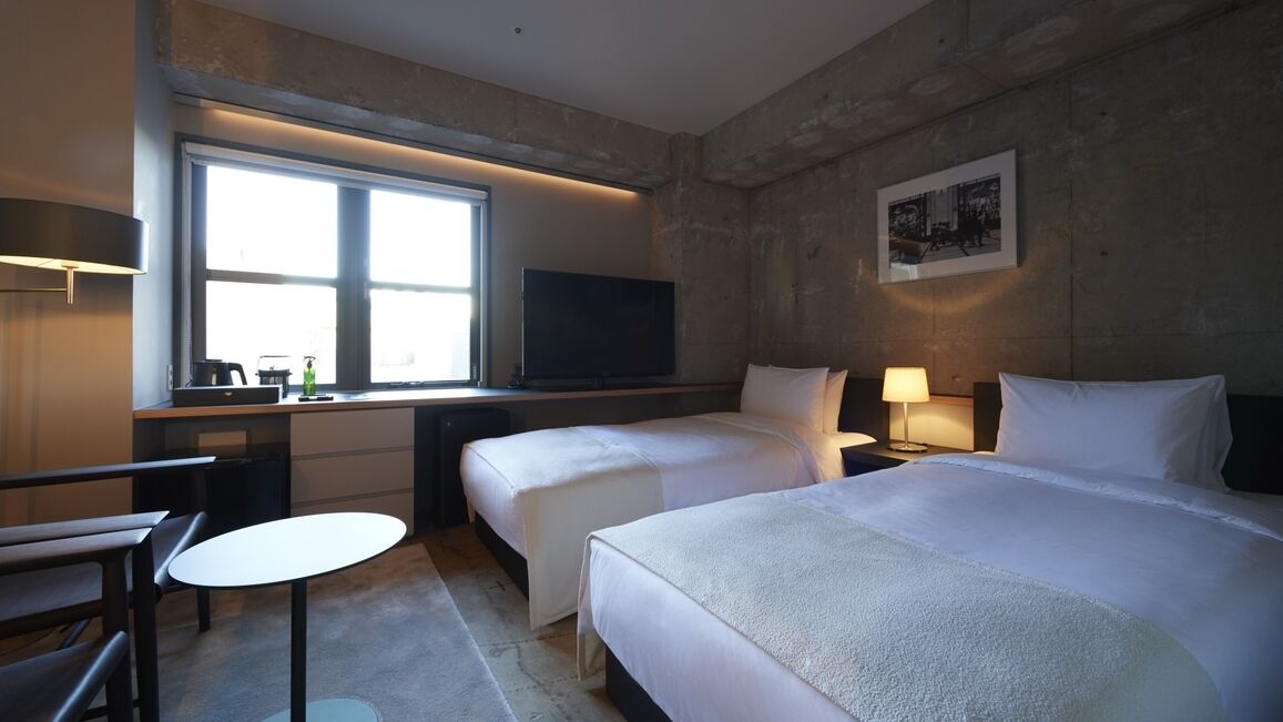 Premium bedding, down duvets, in-room safe, desk