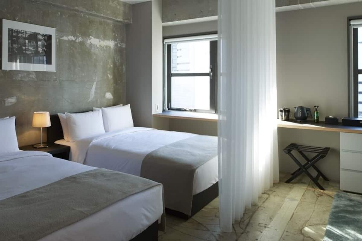 Premium bedding, down comforters, in-room safe, desk