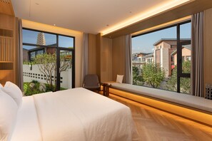 Quarto casal superior, vista para o pátio | Vista do quarto