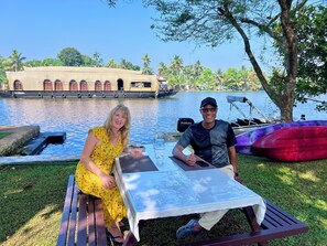 Outdoor dining - The Kerala Heritage Villa on the shore of Backwaters - Pamba River Alleppey (Alleppey)