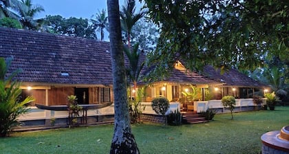 The Kerala Heritage Villa on the shore of Backwaters - Pamba River Alleppey