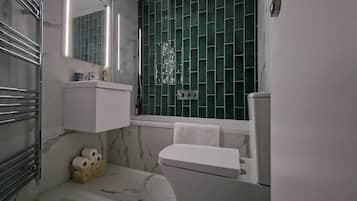 Hair dryer, towels, soap, toilet paper