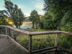 Terrace/patio - Scenic River Retreat w/ Deck •View •Lawn Games • Wood Stove (Gold Beach)