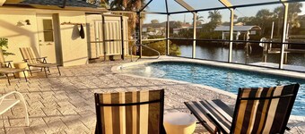 Waterfront 3 bed 2 bath heated saltwater pool home with kayaks and boat dock