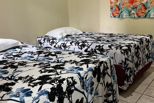 Basic Suite, Non Smoking | 1 bedroom, iron/ironing board (on request), WiFi (free), bed sheets