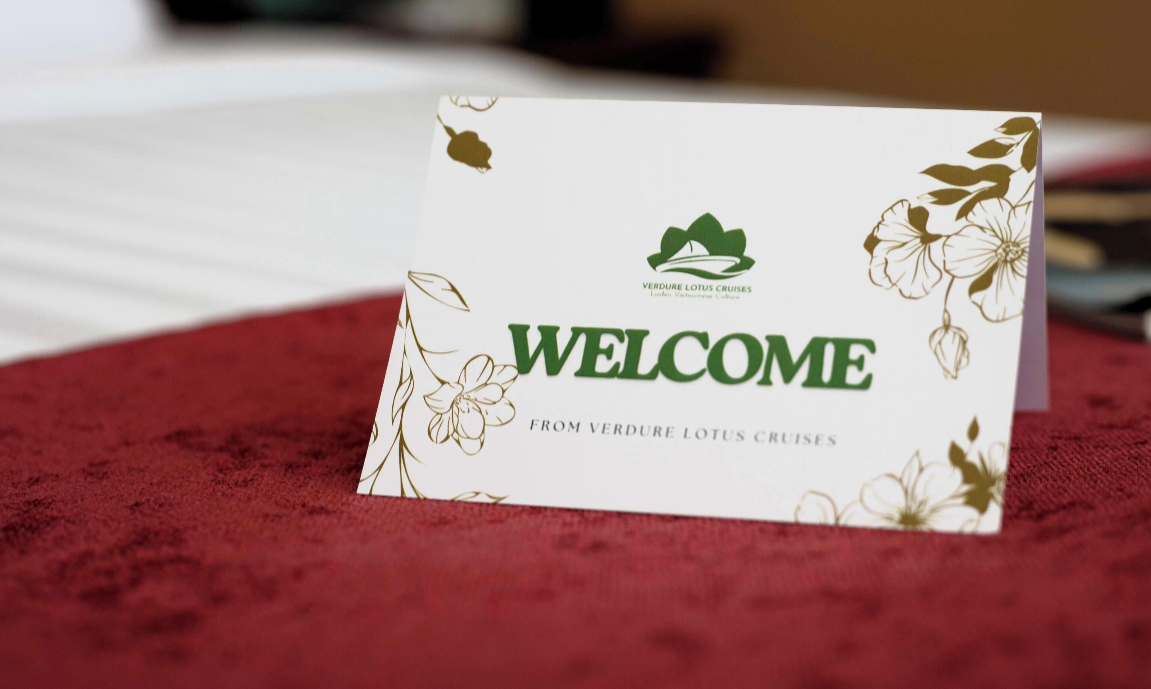A welcome card with a logo and text for Verdure Lotus Cruises.