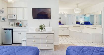 Coastal Condo with golf on-site, shared pool and fitness center