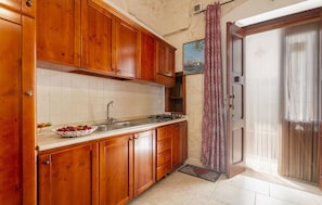 Fridge, stovetop, cookware/dishes/utensils