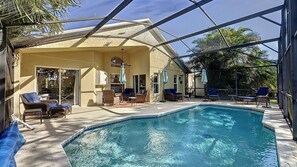 A heated pool - Modern pool home, south facing deck, gated golfing resort of Southern Dunes. (Haines City)