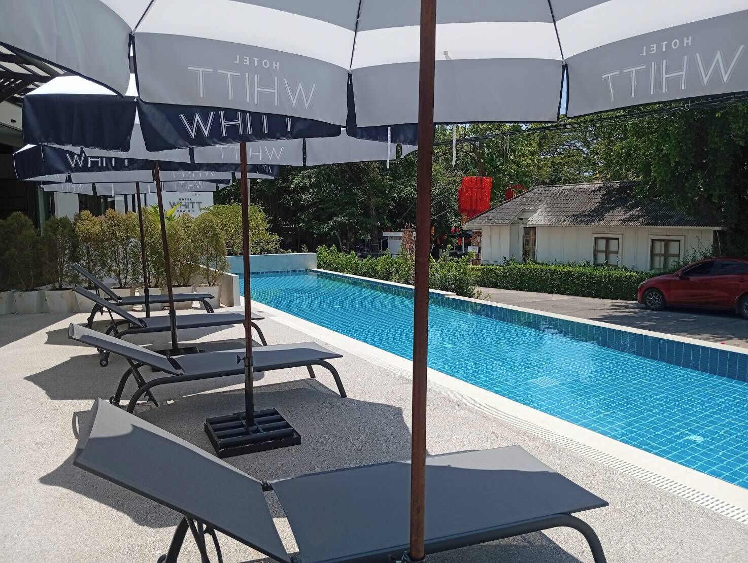 Outdoor pool, open 7:00 AM to 7:30 PM, pool umbrellas, sun loungers