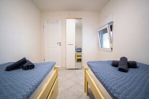 Apartament bàsic, vistes al jardí | 1 dormitori, bressols gratuïts, wifi gratuïta i roba de llit