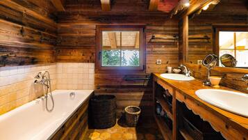 Shower, hair dryer, towels, toilet paper