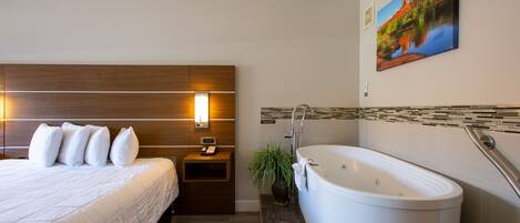 Desk, iron/ironing board, bed sheets