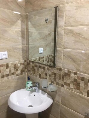 Hair dryer, towels, soap, toilet paper