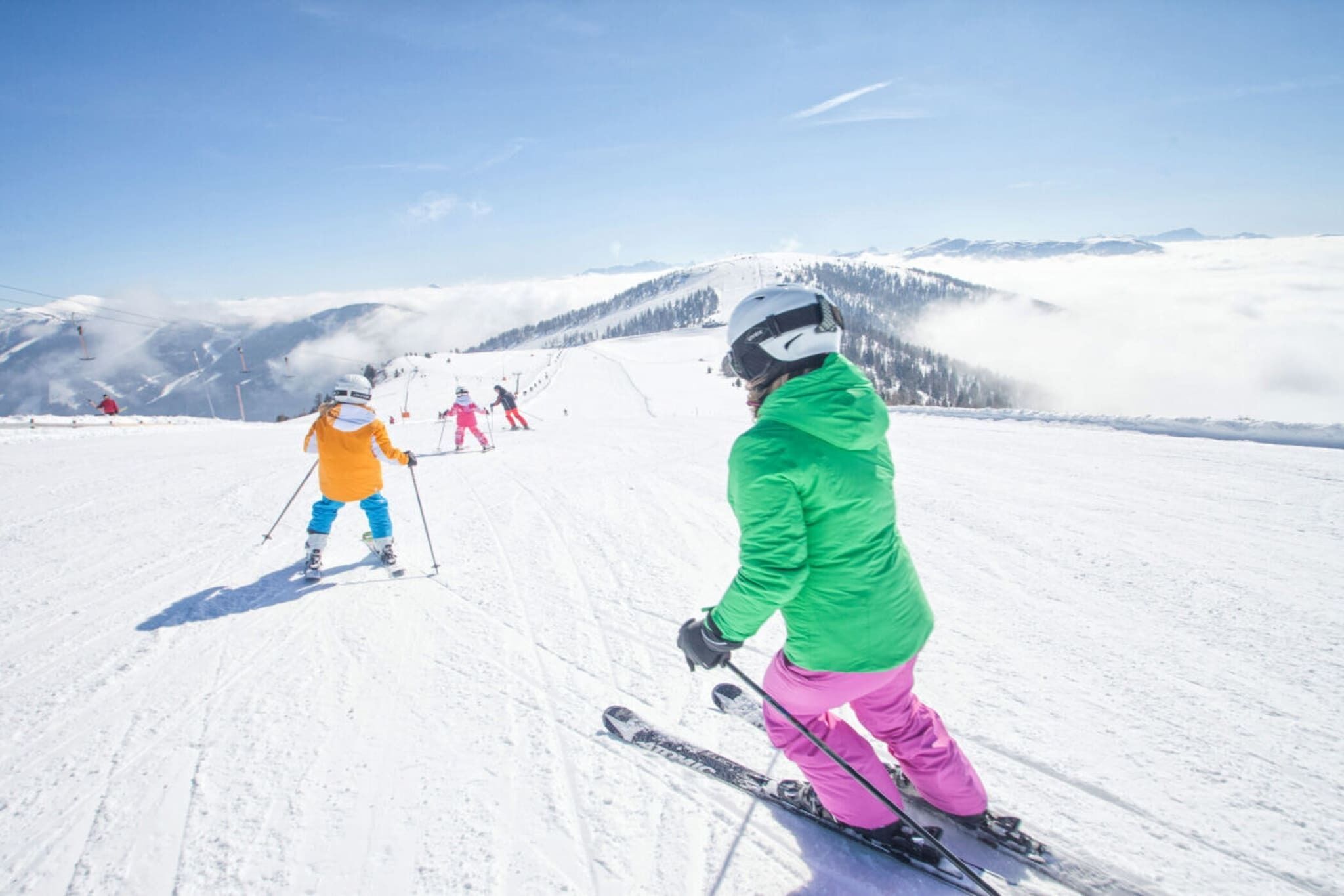 A ski slope with skiers.