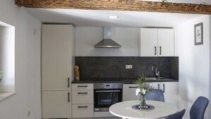 Studio (Studio Apartment with Terrace) | Private kitchen - Mountain Vibrant and Timeless Apartment With Sauna (Dravograd)