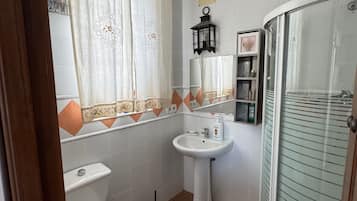 Hair dryer, towels, soap, toilet paper