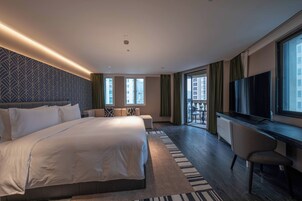 Premium bedding, down duvets, memory-foam beds, free minibar