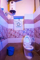 Ducha, artículos de tocador gratuitos, toallas