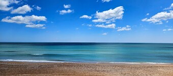 New Beach House: Modern 1BR Beach Oasis Steps to Sand! King Bed, Patio.
