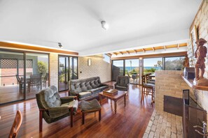 TV, fireplace, books, offices