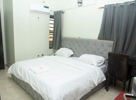 Deluxe Room, Balcony, City View | Desk, laptop workspace, free WiFi