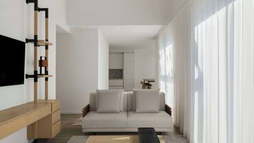 A modern living room with a sofa, TV, and wooden console.