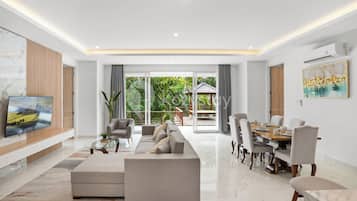 Family Villa, 3 Bedrooms | Living area | Flat-screen TV