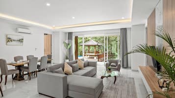 Family Villa, 3 Bedrooms | Living area | Flat-screen TV