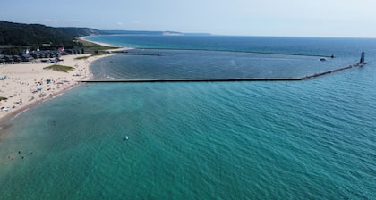 New! Great Lakes Getaway - incredible Lakefront Location! Walk to beach and downtown!