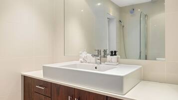 Shower, hair dryer, towels, soap
